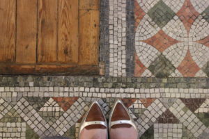 Two shoes on Fitzrovia Chapel mosaic floor